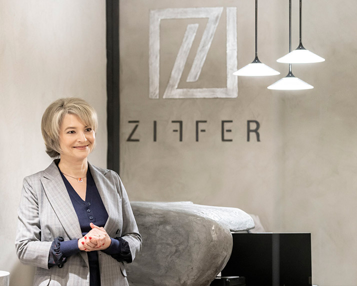 Maria Tkachenko, Founder and Director of Ziffer, in front of the office entrance